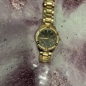 George men’s round black dress watch with classy gold tone metal band